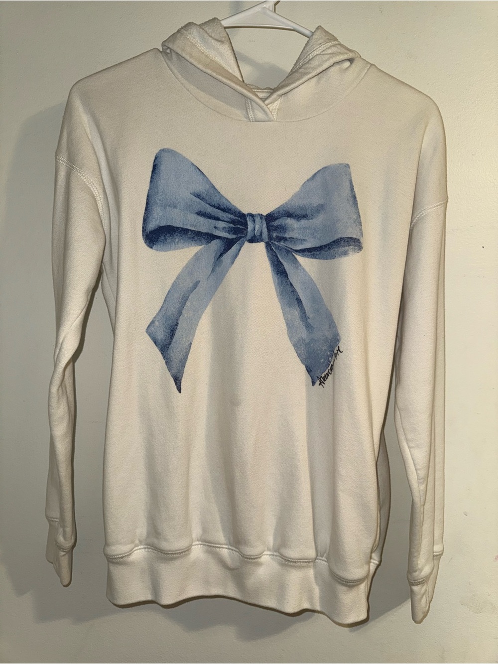 abercrombie kids Cream Hoodie with Blue Bow Graphic